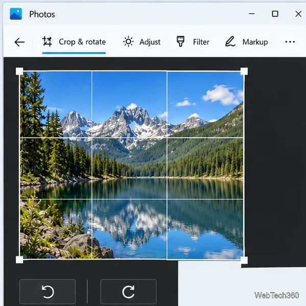 Microsoft Photos editing window showing a landscape image in Crop and rotate with rotate-left and rotate-right controls.